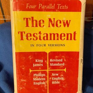 The New Testament In Four Versions - Hard Back With Dust Jacket - Good Condition